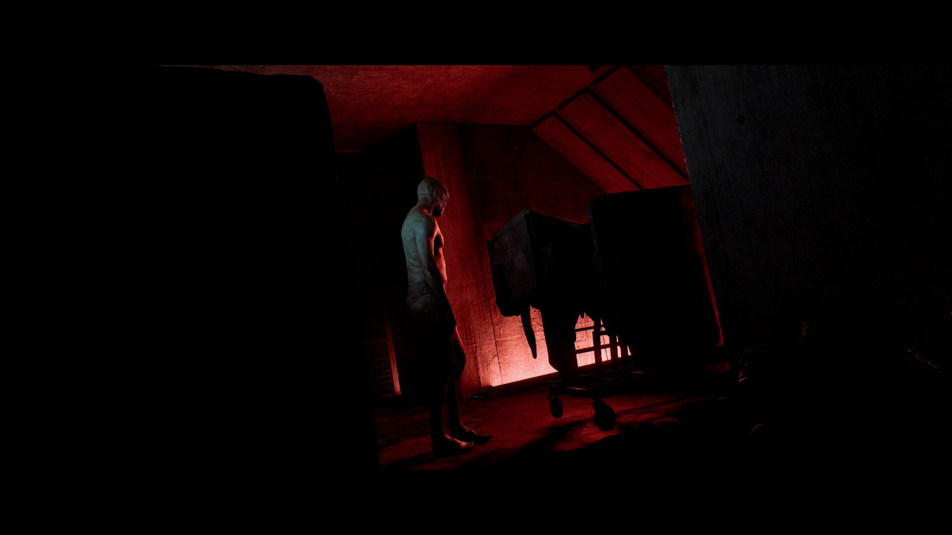A faceless creature standing in the red-lit Otherworld of SILENT HILL: Townfall